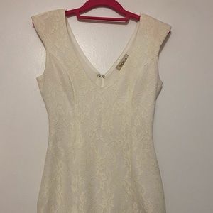 White lace pattern dress with padded shoulders